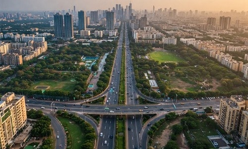 Aerial view of Navi Mumbai showing modern planning, green zones, and city layout