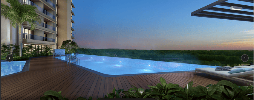 Rooftop infinity pool and luxury amenities at 24K Manor flats in Pimple Nilakh.