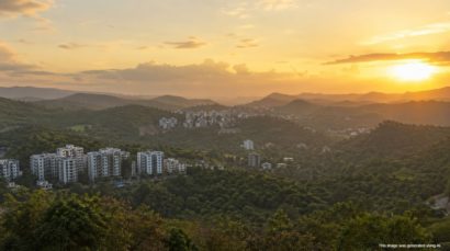 Misty green valley landscape in Bhugaon Pune with hills and nature walking trail