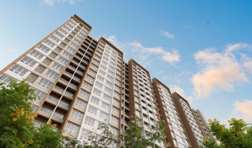 The Winds by Kolte-Patil residential towers with Bhugaon valley hills in background